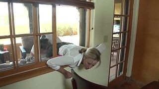 mom gets help from sons being stuck in window